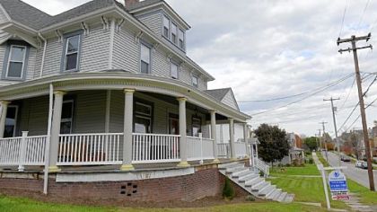 This five-bedroom Victorian in Mount Pleasant features a wraparound porch.