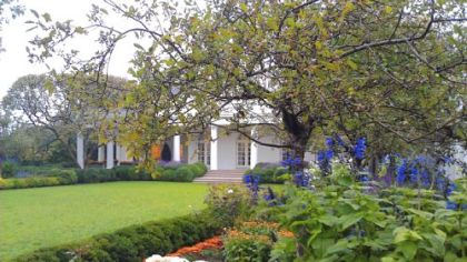 Mums and salvia bloom in beds Friday near the Oval Office at the White House.