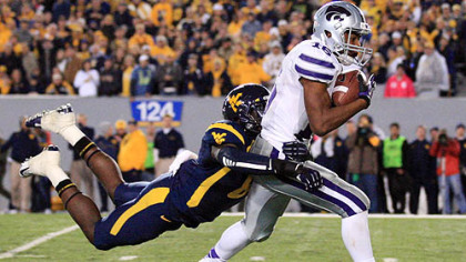 Kansas State's Tyler Lockett is brought down by West Virginia's Karl Joseph during the second quarter.