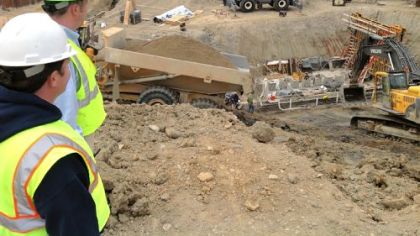 Gary Lobaugh, left, and Tyson Clouser of Pennsylvania American Water view work on a $10 million dam rehabilitation near Butler.