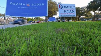 Electoral placards supporting Barack Obama and his Republican rival Mitt Romney are seen near Lynn University in Boca Raton, Fla., where the third and final presidential debate will be held Monday.