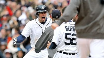 Don Kelly celebrates with teammates after he hit the winning sacrifice fly in the bottom of the ninth inning against the Oakland Athletics in Game 2 of the American League Division Series.