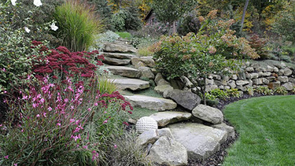 The stone steps and wall in the garden of Rose Romboski.