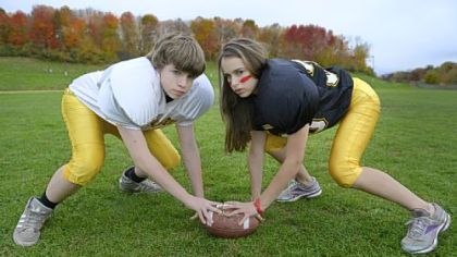 Twins Nicole and Matt Hyatt, 13, play on the Carson Middle School football team.