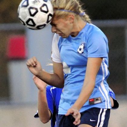 TAKING ONE FOR THE TEAM Central Valley's Ashley Mutkus heads the ball away from the goal in the first half of the Warriors' WPIAL Class AA quarterfinal match against South Park Wednesday night.