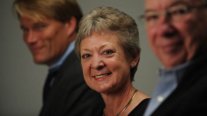 'You lead by example. It has to come through your actions,' says Kim Tillotson Fleming, center.
