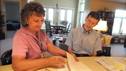 Comfort Keepers' caregiver Margaret Battle works with Robert Stevenson.