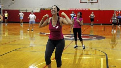 Harshita Gurnani, center, of Fox Chapel takes part in a Zumba class offered by the adult education program at Fox Chapel Area High School.