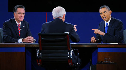 President Barack Obama debates with Republican presidential candidate Mitt Romney as moderator Bob Schieffer looks on.