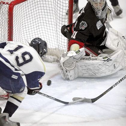 Upper St. Clair goalie Michael Ambrose tries to turn away a shot by LaSalle's Ron Greco during last year's Class AAA state championship game played in West Chester. Ambrose's return to the Panthers lineup is a big factor in their No. 5 preseason ranking.