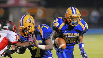 West Mifflin's Jimmy Wheeler, following a block from teammate Diallo Mitchell, is second in the WPIAL in rushing with 1,543 yards.