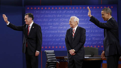 Moderator Bob Schieffer, Mitt Romney, and President Barack Obama  wave to the audience during the third presidential debate at Lynn University, Oct. 22 in Boca Raton, Fla.