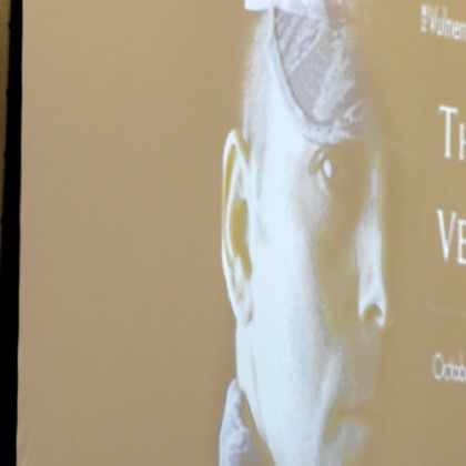 The Rev. John Sawicki, a Duquesne University political science professor, waits as he is introduced to talk about the problem of veteran suicides. Father Sawicki was part of the Third Annual Rita McGinley Symposium's "Exploring Social Justice for Vulnerable Populations: The Face of the Veteran," which was held at the university.