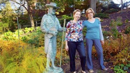 Cynthia Richey, left, library director, and Nancy Smith, head gardener, stand in the Mt. Lebanon Library courtyard garden.