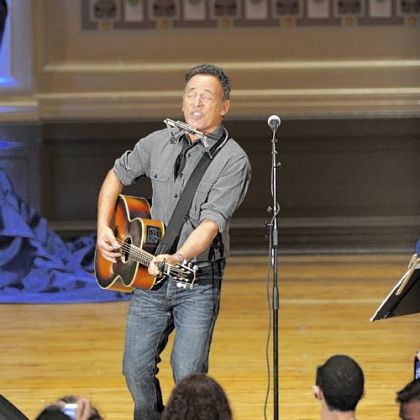 Bruce Springsteen performs at a rally at Soldiers & Sailors Memorial Hall in Oakland. The event was organized by Obama for America to support the campaign's effort to turn out the vote.