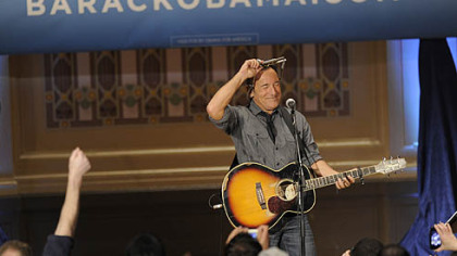 Bruce Springsteen finishes a performance at Soldiers & Sailors, Oakland, as part of a rally organized by Obama for America.