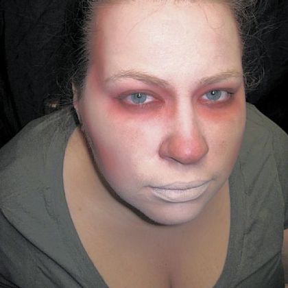 Step Three: Add dark powder blush around eye sockets, under cheekbones and on temples. Start with a concentration of blush on upper and lower eyelids, then radiate color over brow and under eyes to the bottom of the socket for a sick, hollowed-eye look.