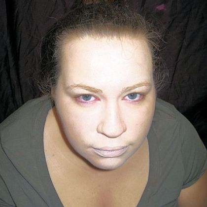 Step Two:  Base out your face and all exposed flesh with pale foundation, including lips. It needs to be paler than your natural skin tone.
