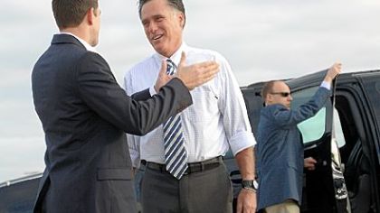 GOP Presidential candidate Mitt Romney bids farewell his running mate Paul Ryan prior to boarding his campaign plane at Denver International airport.