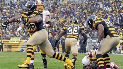 Steelers' Ziggy Hood celebrates after taking down Redskins quarterback Robert Griffin III in the second quarter Sunday at Heinz Field. Griffin managed only 8 rushing yards on the game.