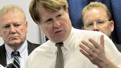 Allegheny County Executive Rich Fitzgerald, center, speaks Monday to reporters about the county's readiness to deal with any weather damage caused by Hurricane Sandy.