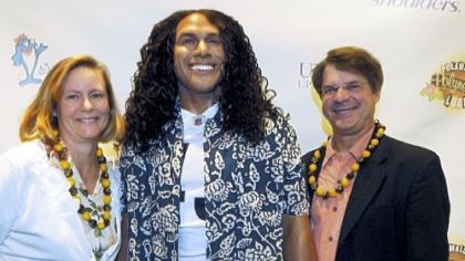 Jan and Richard Piacentini with a statue of Troy Polamalu.