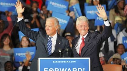 Vice President Joe Biden and former President Bill Clinton greet the crowd Monday at the Covelli Centre in Youngstown, Ohio.