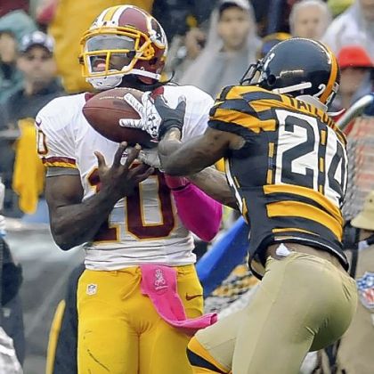 Steelers'' Ike Taylor breaks up a pass intended for Robert Griffin III in the second quarter Sunday at Heinz Field.