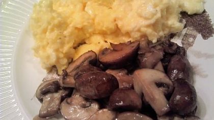 Soft scrambled eggs with mushrooms.