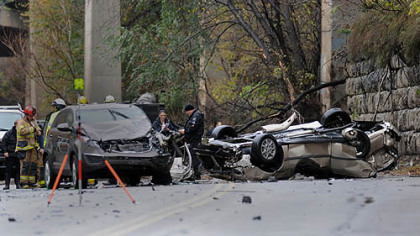 Police investigate an early morning accident on Second Avenue that closed the road between the 10th Street Bridge and Bates Street.
