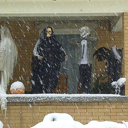 Halloween decorations are seen during a snowstorm, Tuesday, Oct. 30, 2012, in Elkins, W.Va.