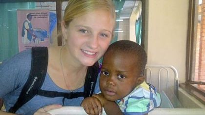 Mt. Lebanon field hockey player Meghan Schneck with patient Ninzu Pinta on her trip to Zambia earlier in the fall.