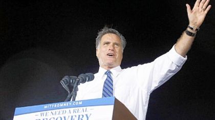 Republican presidential candidate Mitt Romney speaks during a rally Thursday at the Defiance High School football stadium in Defiance, Ohio.