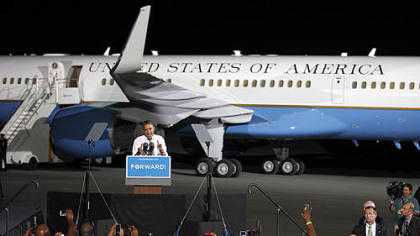 Barack Obama speaks in front of Air Force One at a campaign event at Burke Lakefront Airport in Cleveland.