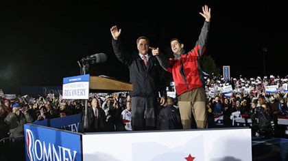 Republican presidential candidate Mitt Romney and his vice presidential running mate, Rep. Paul Ryan, R-Wis., campaign Friday at the baseball field of North Canton Hoover High School in North Canton, Ohio.