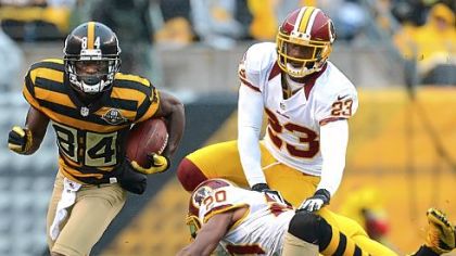 Antonio Brown, left, was singled out by Mike Tomlin for a taunting penalty in Sunday's game against Washington.