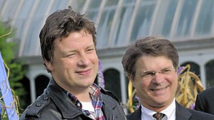 Jamie Oliver, left, with Phipps executive director Richard Piacentini Oct. 18 at the Phipps roof garden.