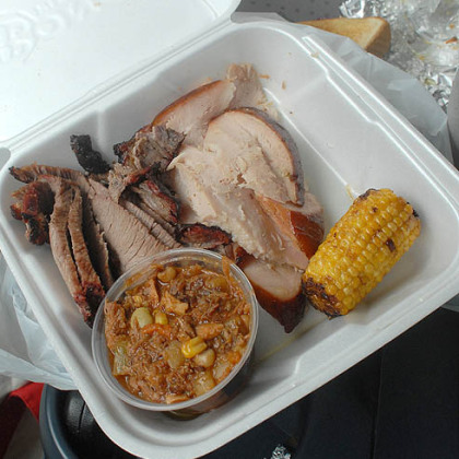 Dinner at Bono's, in the car because Weegee wasn''t welcome in the dining room.  From left, brisket, turkey, grilled corn, Brunswick stew.
