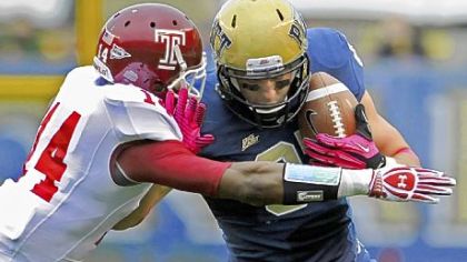 Pitt receiver Mike Shanahan tries to fend off Temple's Vaughn Carraway Saturday at Heinz Field. Notre Dame is next for the Panthers.