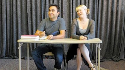 John Biles, left, and Holly Bryant Scott rehearse "The Last Five Years," a musical that is being performed at the new location of Off the Wall Theater in Carnegie. Mr. Biles, a native of Shaler who has returned to the region after living in New York, is producing the play as well as performing in it.