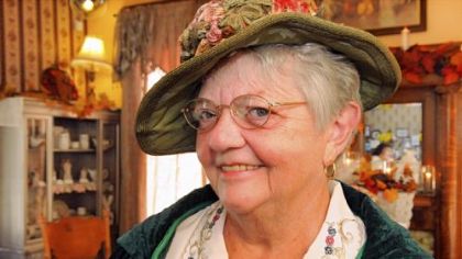 Brenda Hoffman with her circa 1920 silk rosette hat.