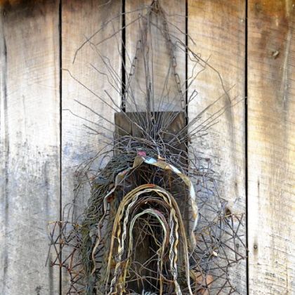 Artwork from recycled materials is displayed around the property.