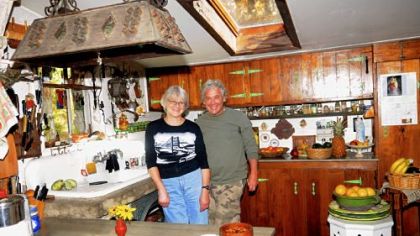 Ted and Kathy Carns in their Stone Camp house.