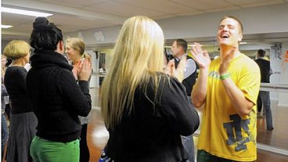 James "J.D." Keller applauds after a dance during the dance class Sunday at Steel City Ballroom in Mt. Lebanon.
