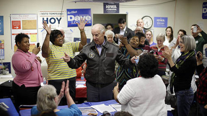 Vice President Joe Biden speaks with volunteers during a visit to a campaign field office in Davenport, Iowa.