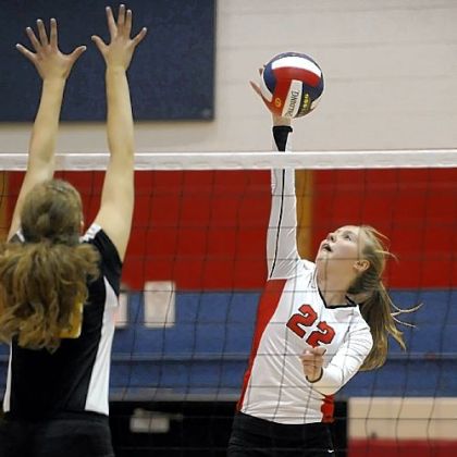Fox Chapel's Megan Hollingsworth goes for a kill against North Allegheny Thursday night.