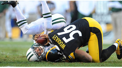 Steelers linebacker LaMarr Woodley sacks New York Jets quarterback Mark Sanchez during a game in September.
