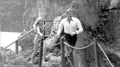 Britt Eklund and Roger Moore star in the James Bond thriller "The Man With the Golden Gun."