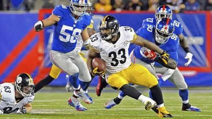 Isaac Redman carries against the Giants in the fourth quarter Sunday at MetLife Stadium in East Rutherford, N.J. Redman ran for 147 yards on 26 carries with one touchdown.