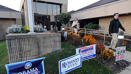 Early voters stream out of the Green Tree Municipal Building after casting their ballots early today.